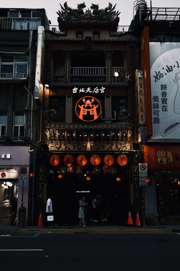 Temple facade lit at dusk